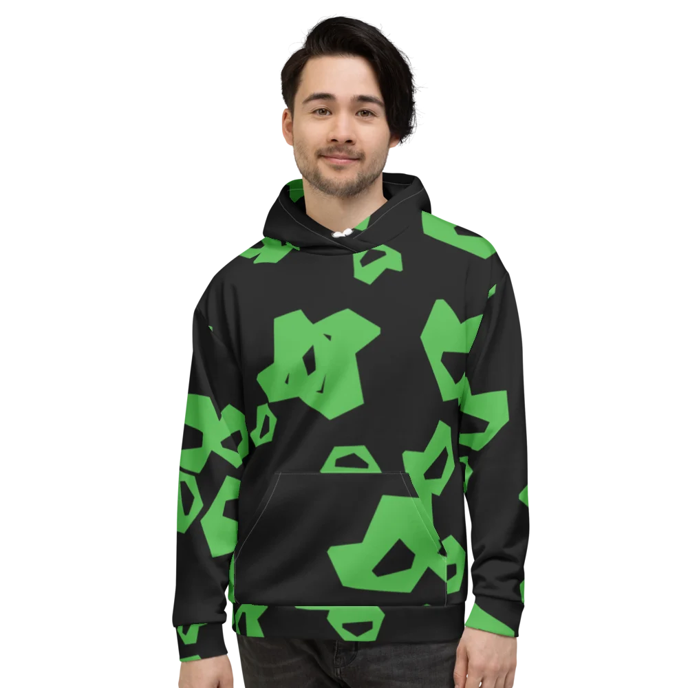 A man wearing a black pullover hoodie printed all over with large green davis9001 marks at different angles.