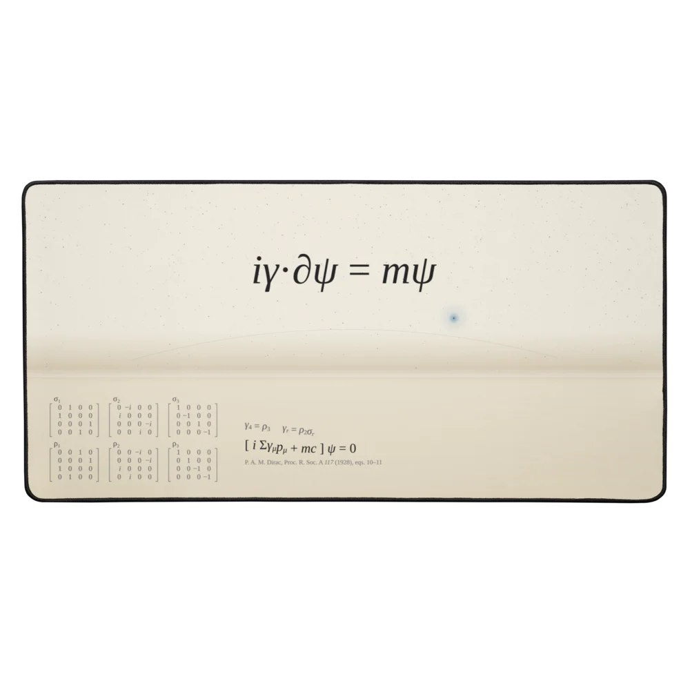 Long cream desk mat. Centre top, in black: i gamma dot partial psi equals m psi. A faint horizon crosses it with one blue star above, and in the bottom-left corner, small, Dirac’s six matrices.