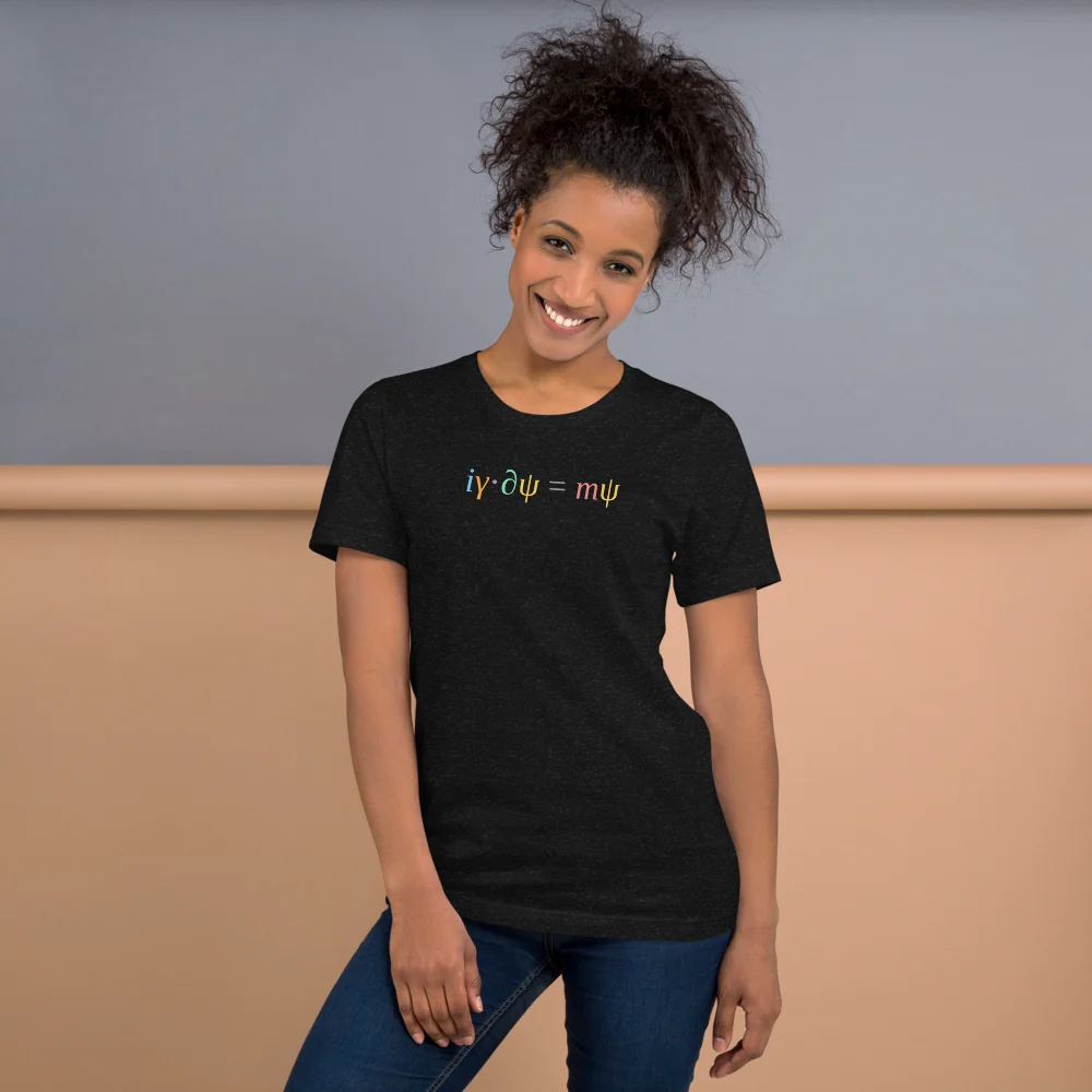 A smiling woman wearing the t-shirt, the coloured equation across her chest.